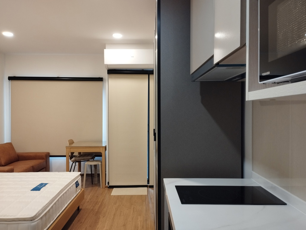 ขายห้องสตูดิโอ The Livin Ramkhamhaeng ขนาด 22.94 ตรม. ชั้น 10 วิวสระแนวยาว สวยสุดๆ ระเบียงทิศเหนือ เ