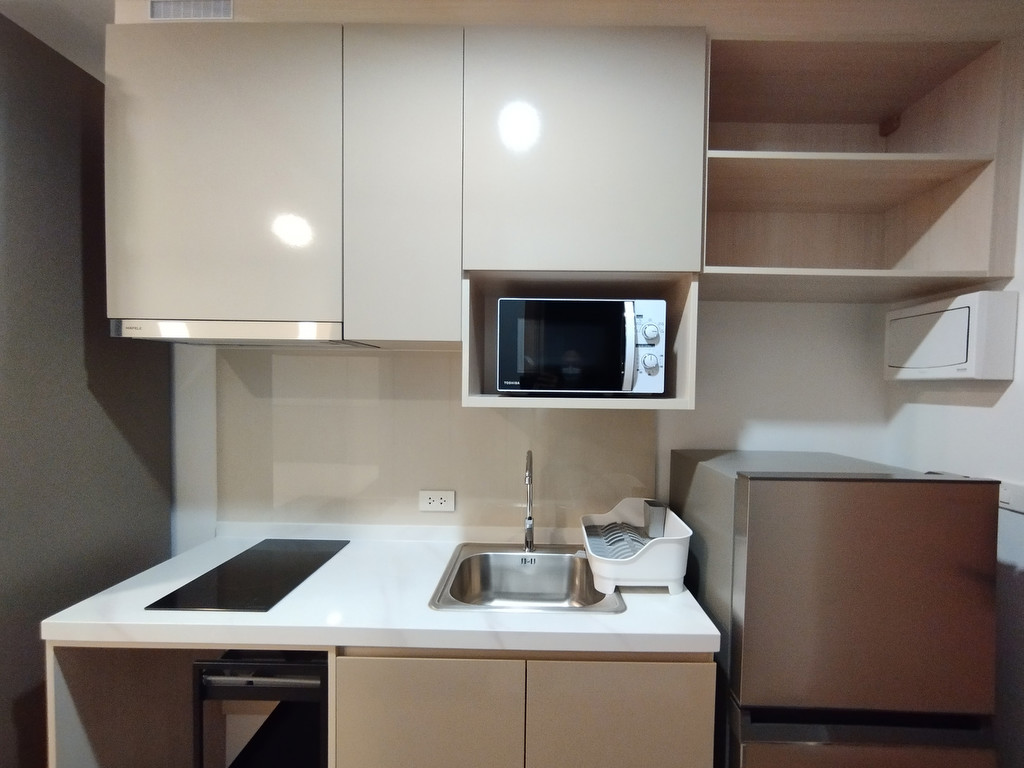 ขายห้องสตูดิโอ The Livin Ramkhamhaeng ขนาด 22.94 ตรม. ชั้น 10 วิวสระแนวยาว สวยสุดๆ ระเบียงทิศเหนือ เ